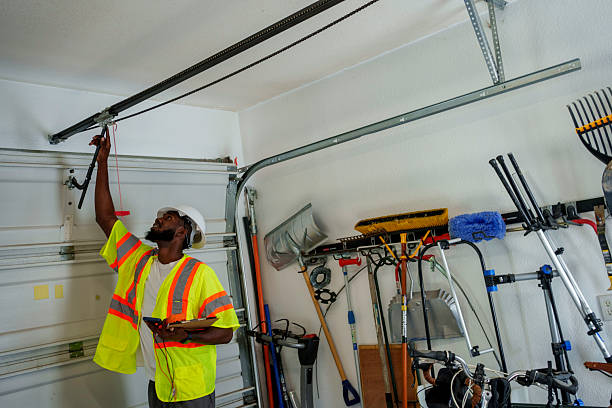 Professional Garage Door Panel Replacement technician working in Middleport, NY